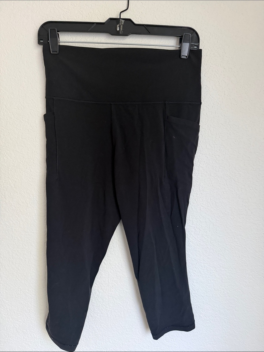Athleta Black High-Rise Capri Leggings with Side Pockets